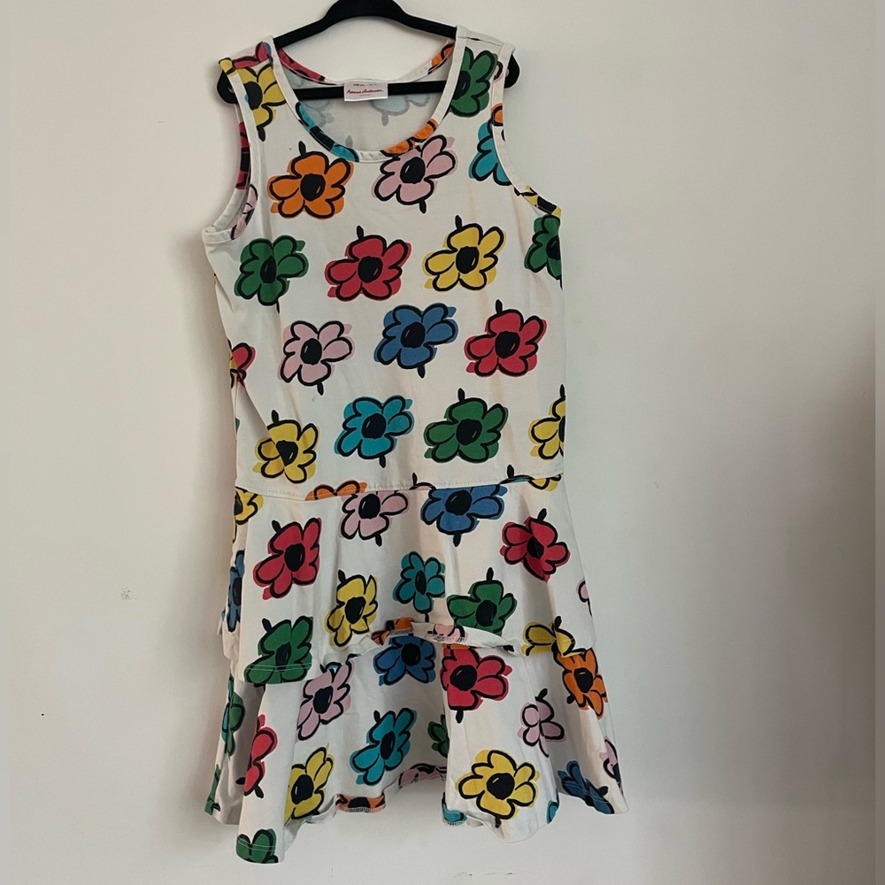 Casual colorful flower tank dress with bottom ruffles.